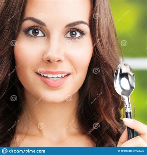 Smiling Young Dark Haired Girl With Spoon Stock Image Image Of Haired