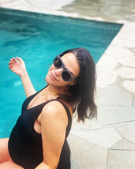 heavily pregnant neha dhupia flaunts her curves as she enjoys pool party in black swimsuit see pics
