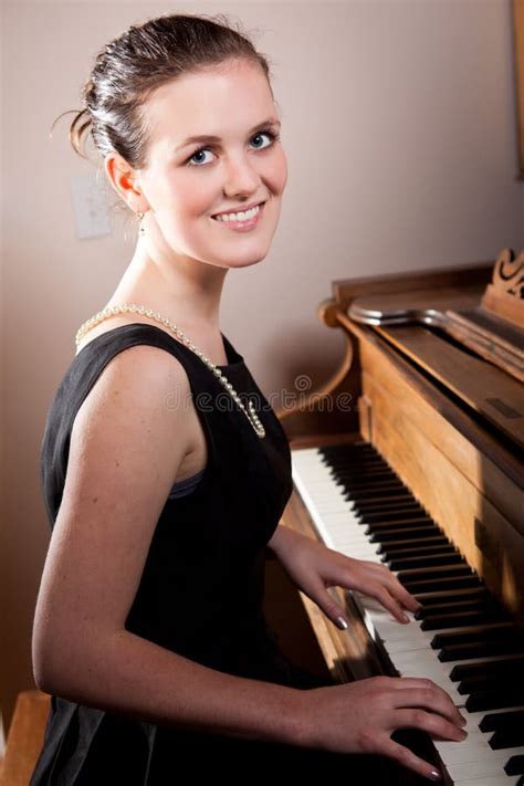 smiling piano teacher stock image image of instrument 1721967