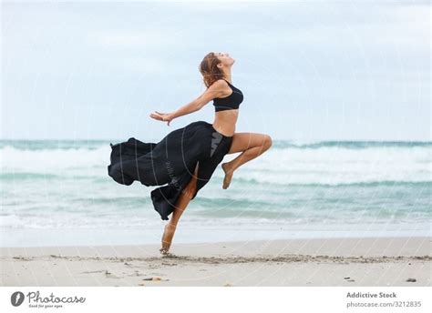 Beautiful Woman Dancing Near Sea A Royalty Free Stock Photo From Photocase