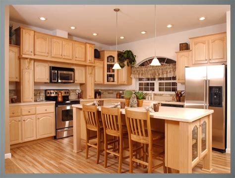 'a classic color tends to stand the test of time so deep blues, greens and grays are always a good choice if you worry about your kitchen dating. Kitchen Paint Colors With Maple Cabinets - Bedroom Colour ...