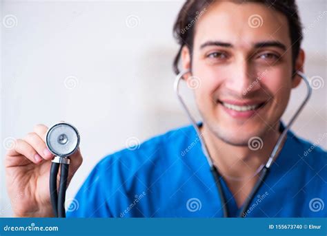 Young Male Doctor With Stethoscope Stock Photo Image Of Optimistic