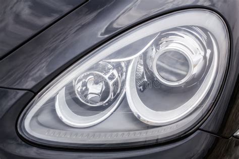 Headlight Of Car Closeup Isolated On White Background With Clipping