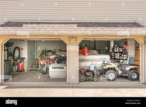 Dual Garage Of Middle Class American Home In Kentucky Usa Stock Photo