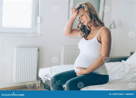 Portrait Of Pregnant Woman Suffering From Headache Stock Image Image Of Indoors Headache
