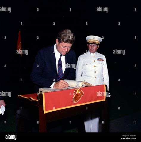 president kennedy views the marine corpsu0027 evening parade at the marine barracks washington