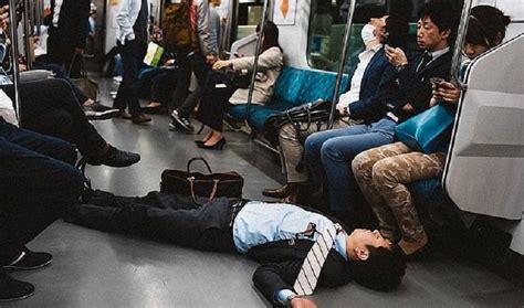 Twitter Account Posts Photos Of People Dozing Off In The Streets Of Tokyo