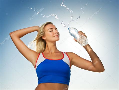 Woman Drinking Water After Fitness — Stock Photo © Nejron 2083199