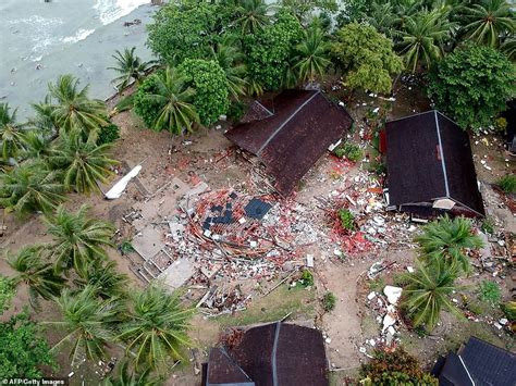 horrific moment indonesian tsunami victim is swept away as enormous volcanic wave crashes into