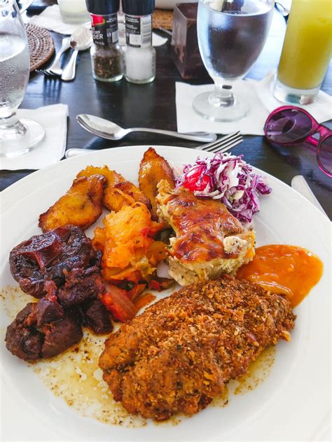 the 13 best barbados restaurants according to locals bacon is magic caribbean restaurant