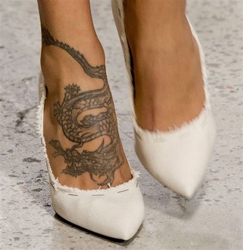See more ideas about tattoos, ankle tattoos, ankle tattoo. Oscar de la Renta S/S 2018 | Foot tattoos, Chinese dragon tattoos, Foot tattoo