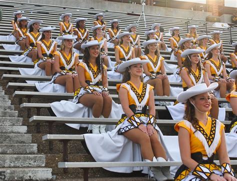 apache belles in rim skirts before traditional rim march drill team pictures drill team