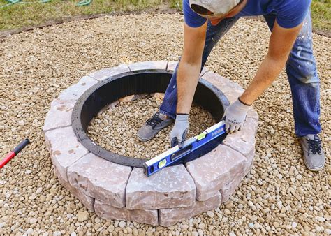 Then they got ready to build the fire pit. Build a Backyard Fire Pit This Weekend! | Fire pit backyard, Fire pit, Diy fire pit cheap