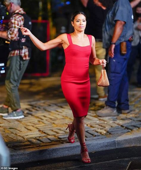 Gina Rodriguez Stuns In Red Pencil Dress And Heels While Filming