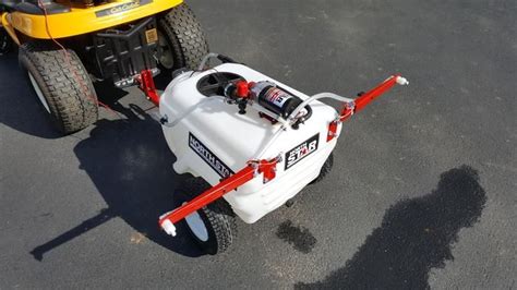 Extra length creates largest deck space for operator seated tow tractor ! NorthStar Tow-Behind Trailer Boom Broadcast and Spot ...