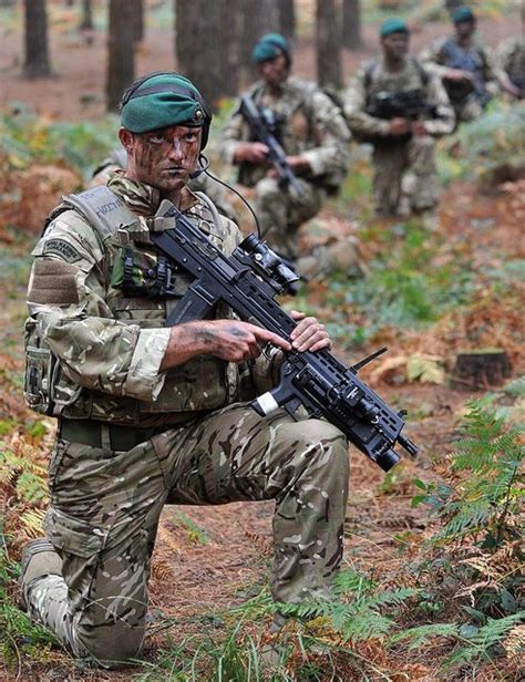 Royal Marine Commandos On Exercise In British Woodland Marine