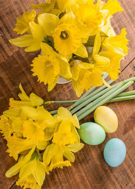 Easter Eggs And Yellow Daffodils Stock Photo Containing Flowers And
