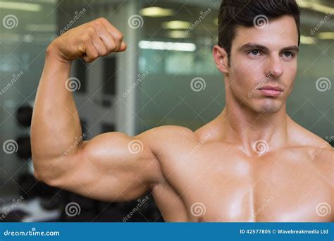Close Up Of Muscular Man Flexing Muscles Stock Image Image Of