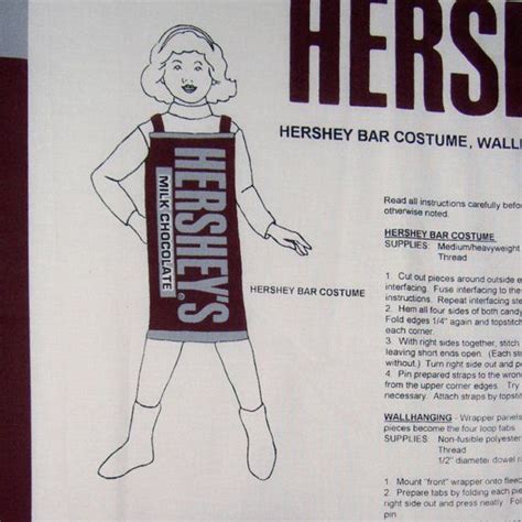 An Advertisement For Hershey Bar Costume Is Shown On The Wall In Front