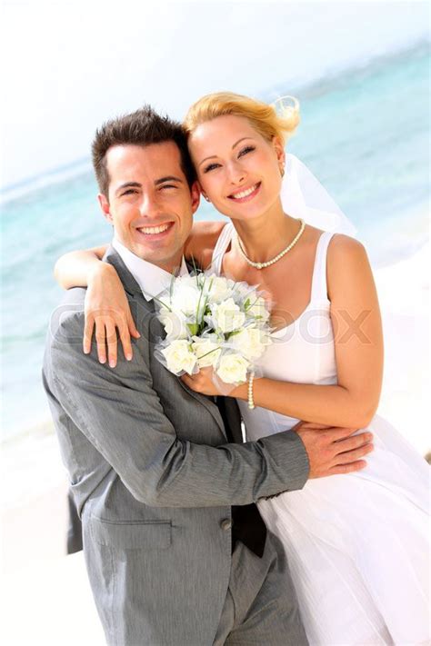 Cheerful Married Couple Standing On The Stock Image Colourbox