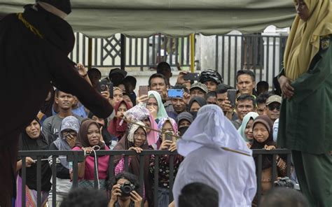 Indonesian Christians Flogged In Rare Shariah Punishment For Non Muslims Wsj