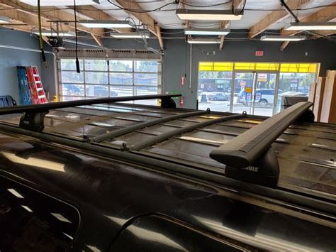 Aluminess roof rack for @dannymillerkidd ford excursion with custom box, expedition kit and light bar #aluminess #roofrack #ford #fordexcursion #8inchlift #survivaltraining. Ford Excursion Rack Installation Photos