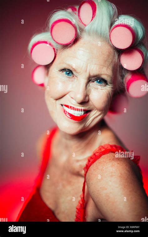 Portrait Of A Woman With Curlers In Her Hair Hi Res Stock Photography