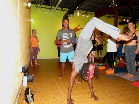Maybe you would like to learn more about one of these? Walter Mugwe and Catherine Njeri demostrate a yoga move at Dancing Dogs. | Yoga moves, Dance, Yoga
