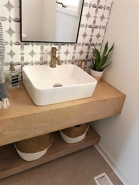 Two large floating shelves give enough storage space and look modern and chic. Honest Review of my DIY Wood Bathroom Vanity - 2 Years ...