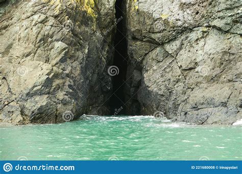 Cracked Mossy Rocks A Sea Cave Underneath Stock Photo Image Of
