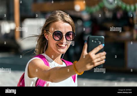 Happy Tourist Girl Taking Selfie Stock Photo Alamy