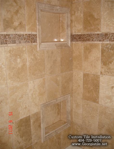 Travertine shower tuscan style inspired travertine shower with simple rectangular tiles on bottom and diagonal tiles over eye level, the two sections divided this picture shows a very attractive and decorative stylization of a shower cabin. Tub Shower Travertine Shower Ideas Pictures
