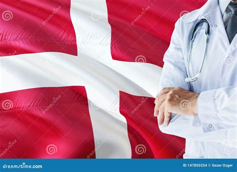 Danish Doctor Standing With Stethoscope On Denmark Flag Background