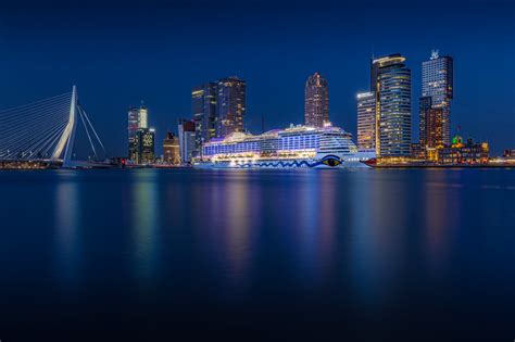 Luxury Cruise Near City Structures During Night Time Hd Wallpaper