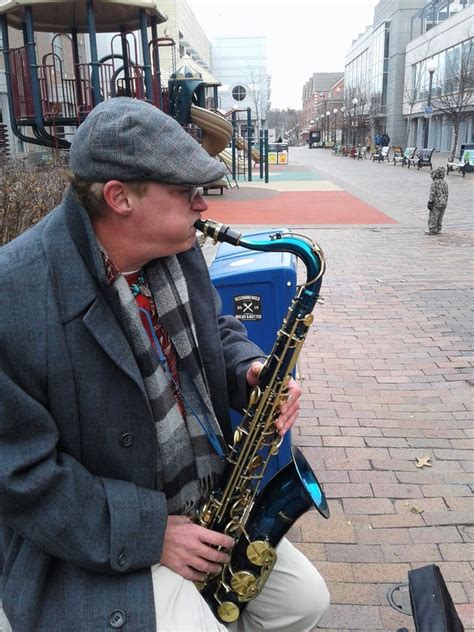 Meet the saxophone player who busks on the Iowa City pedestrian mall