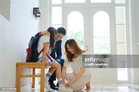 Dad Tying Shoelace Photos And Premium High Res Pictures Getty Images