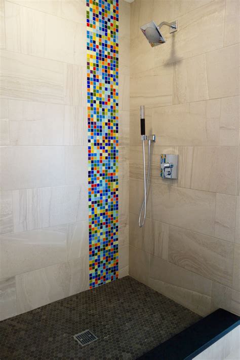 Navy blue hues repeat on this shower's floor tile and shelving backsplash. Pin on Susan Jablon Bathroom Tile Ideas
