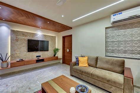 A ceiling fan and beautiful inset lighting create the comfortable ambiance that makes this the place you want to stay. Bungalow Interior Design | DETales - The Architects Diary
