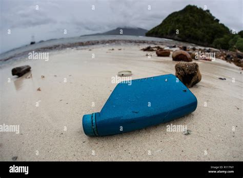 Discarded Plastic Bottles Have Washed Up On A Remote Beach In Raja