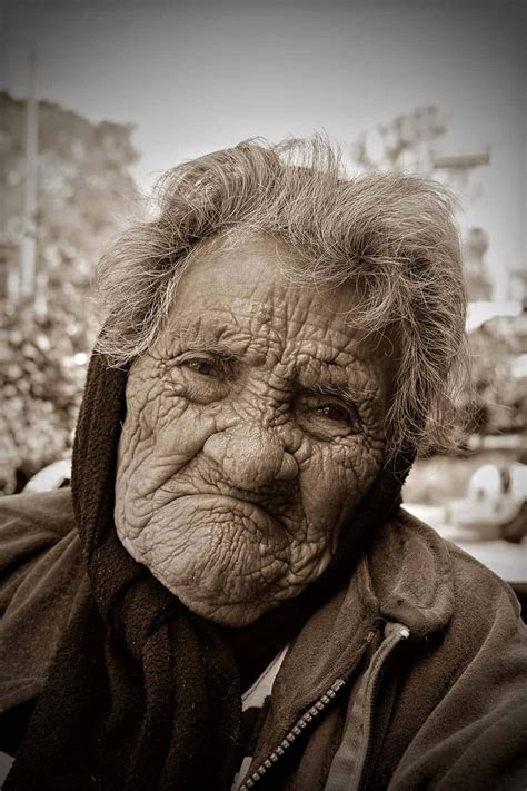 Download Wrinkled Face Old Lady Closeup Wallpaper