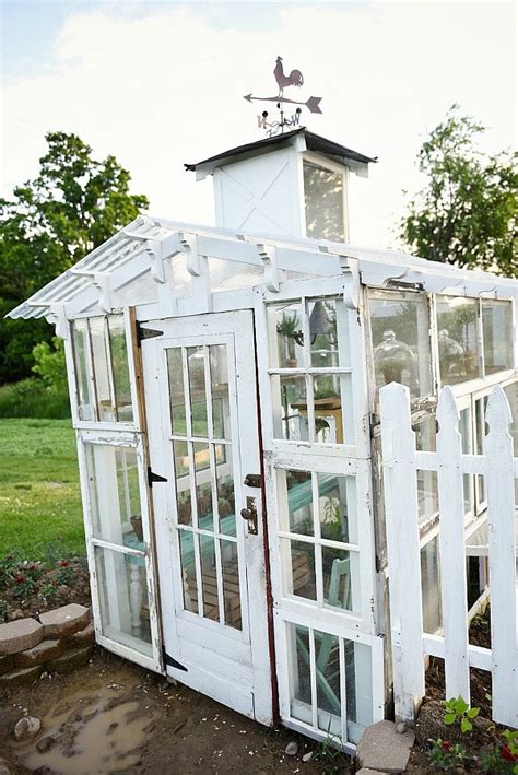 The easy to store foldable greenhouse plan. DIY Window Greenhouse - Liz Marie Blog
