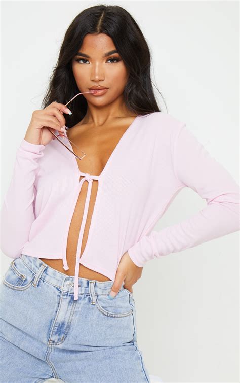 Baby Pink Rib Tie Front Long Sleeve Crop Top Prettylittlething Ca