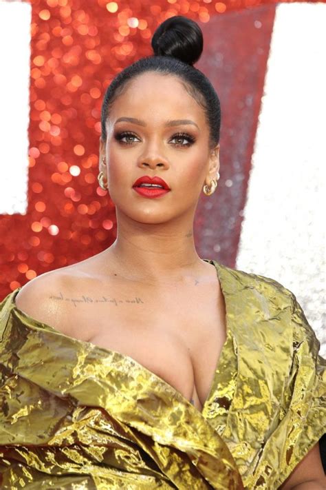 Rihanna Narrowly Avoids Nip Slip As She Flashes Entire Boob In Red