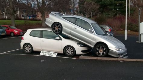 car ends up on vehicle s roof at kirkcaldy station car park bbc news