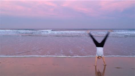 Sunset Handstand On Fistral Beach Ith Oceanflow Yoga