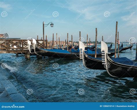 Venice Italy Gondolas On The Dock Near Piazza San Marco Editorial
