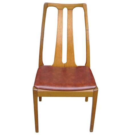 It touches and reflects the body that sits on it, with arms, legs, seat and back. Six Vintage Danish Mid-Century Modern Dining Chairs at 1stdibs