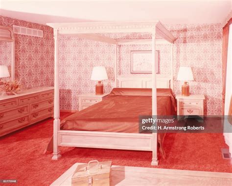 Four Poster Bed In Bedroom With Wall To Wall Shag Pile Carpeting High