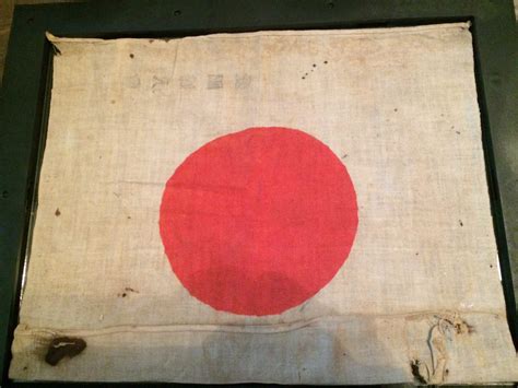 Recently, i discovered a japanese flag imposed with writing on it. Need help! WW2 Japanese Flag