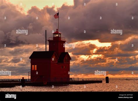 Holland Michigan USA The Holland Harbor Light Also Known As Big Red Just After Witnessing